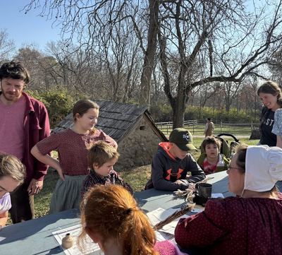 Children at an event at Lincoln Log Cabin
